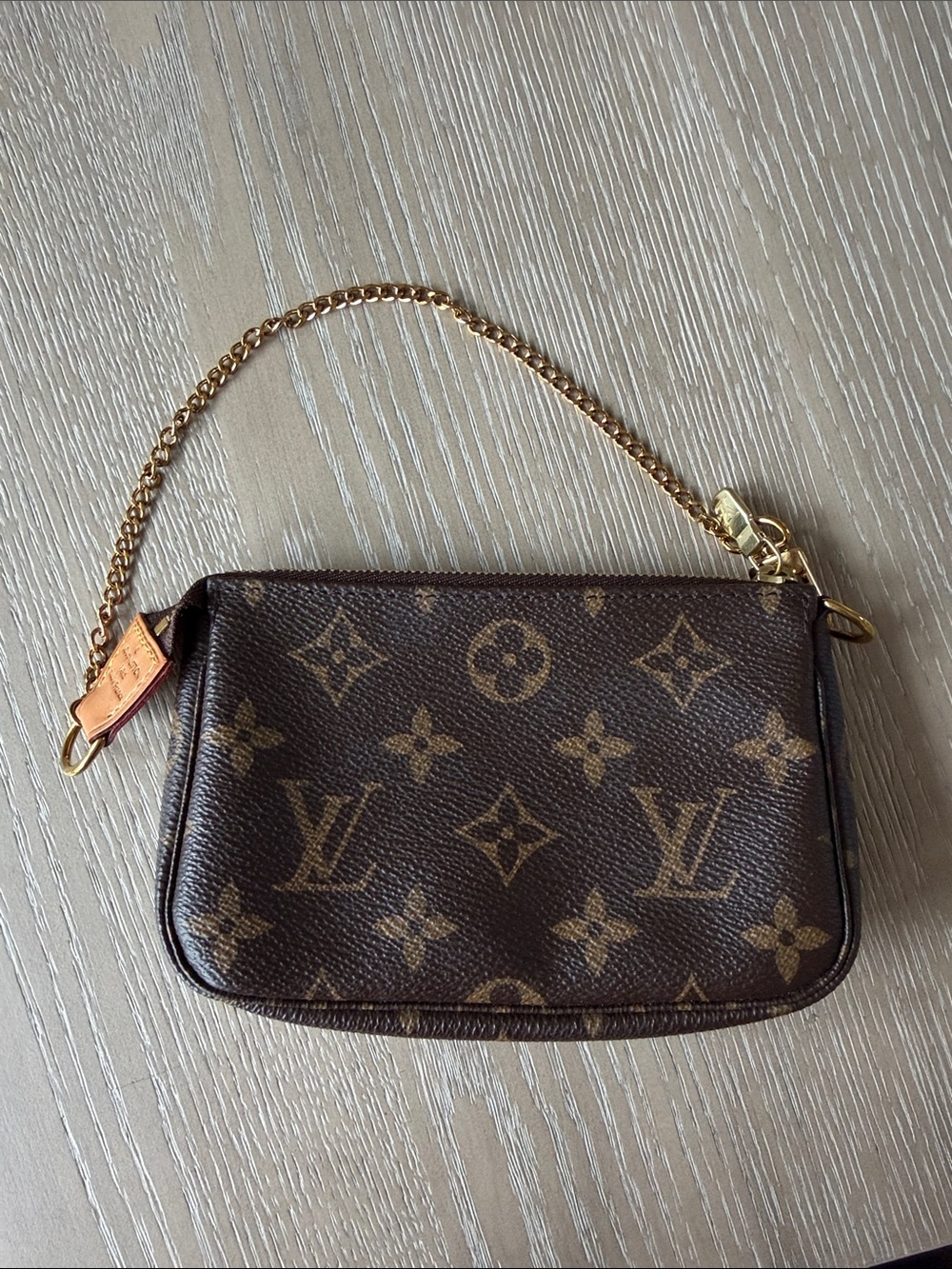 Louis Vuitton Monogram Canvas Mini Pochette in Brown with Gold Chain